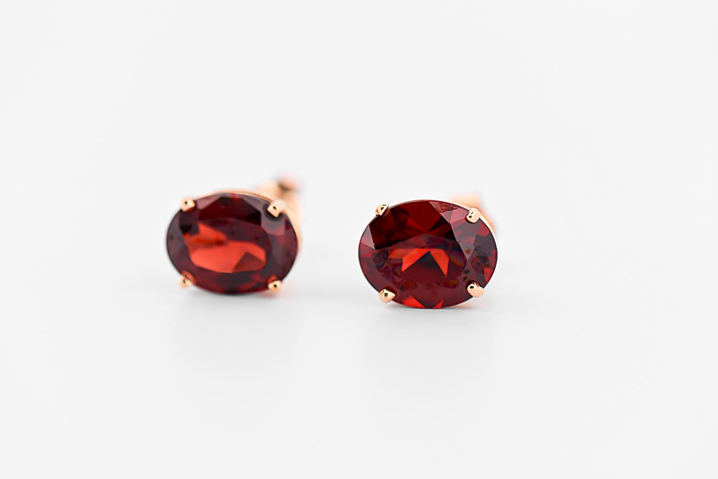 Oval Red Garnet Studs in 14k Yellow Gold