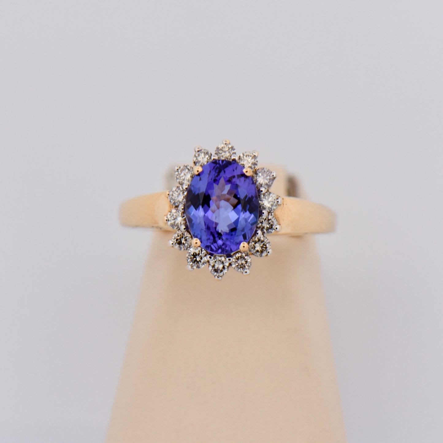 Oval Tanzanite & Diamond Halo Ring
