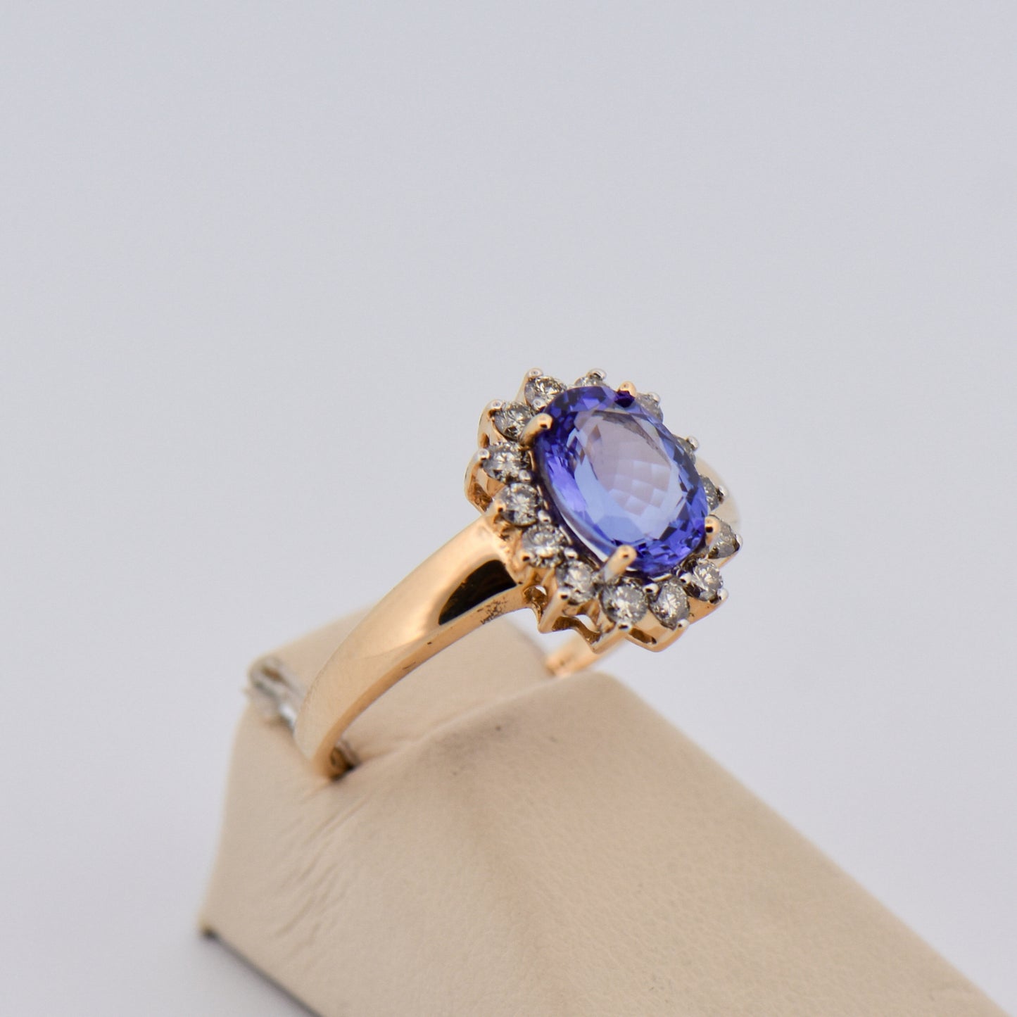 Oval Tanzanite & Diamond Halo Ring