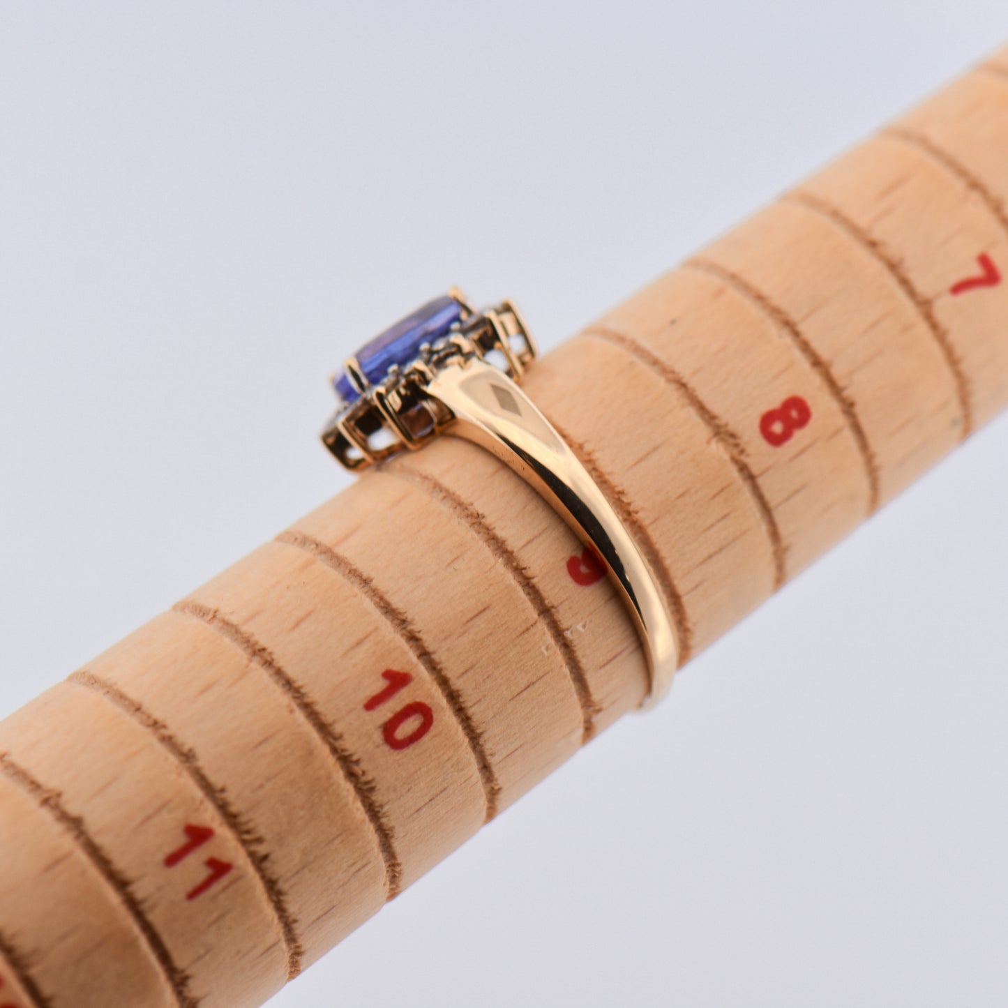 Oval Tanzanite & Diamond Halo Ring