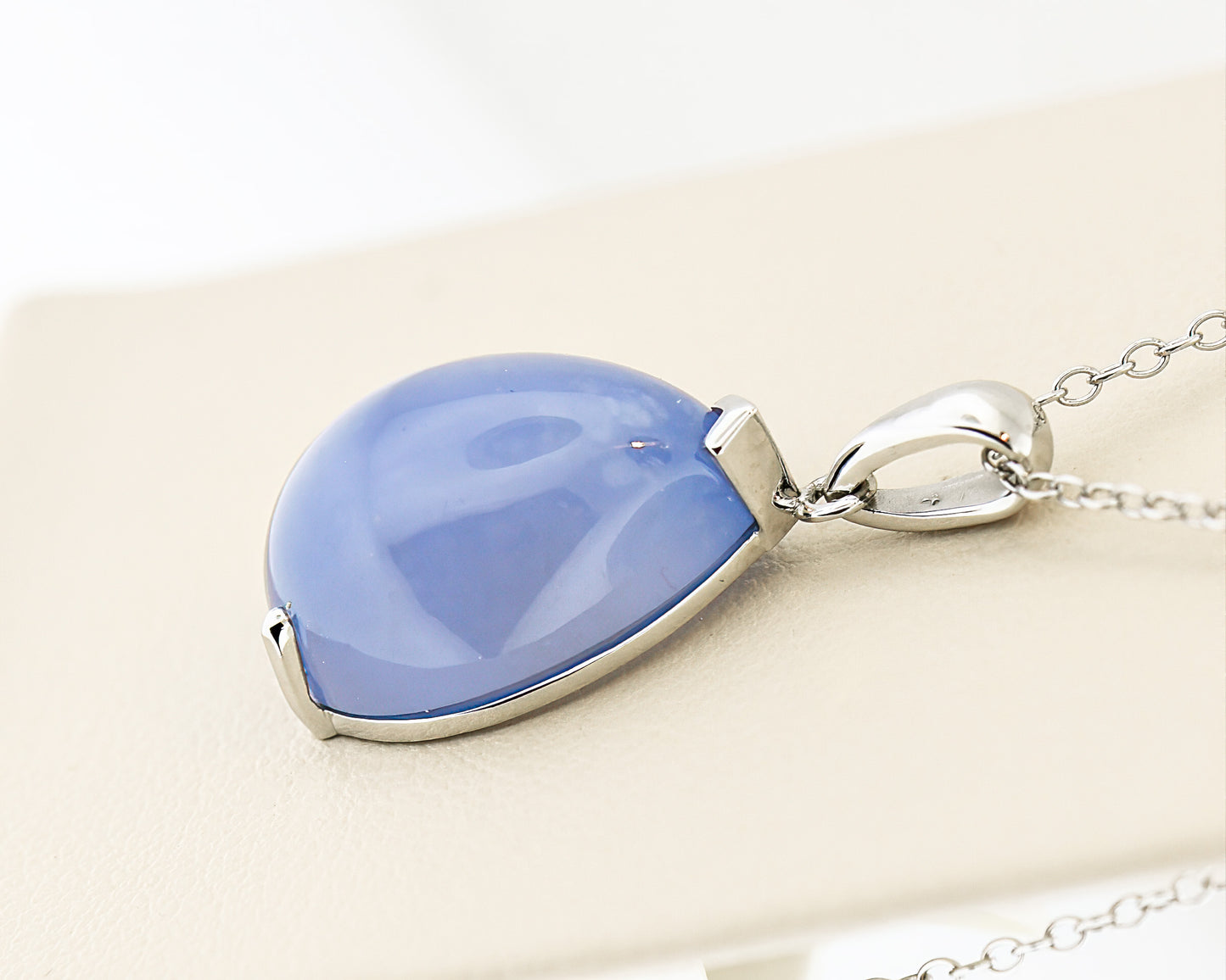 Pear Cabochon Chalcedony Pendant in 14k White Gold
