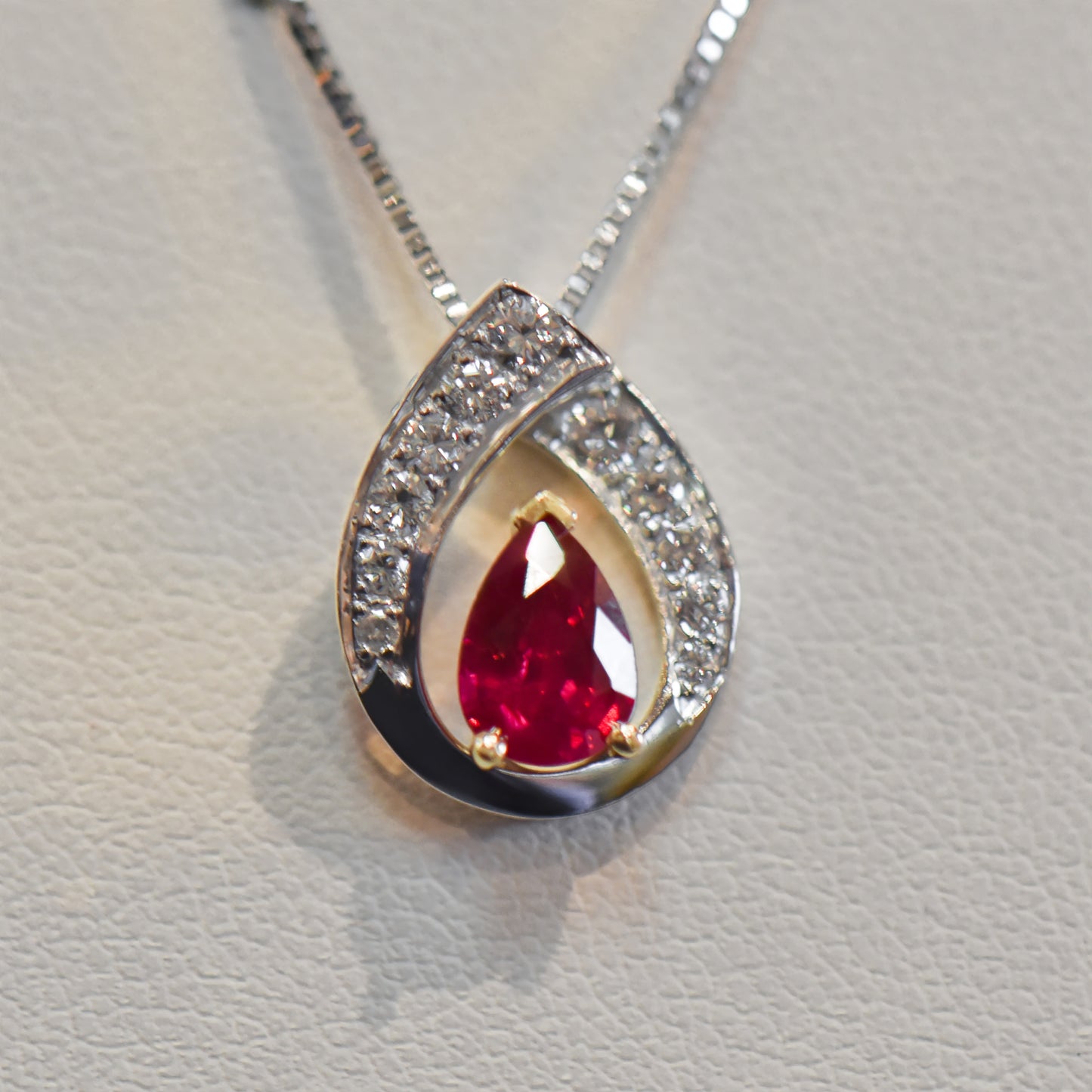 Pear-Shaped Ruby and Diamond Swirl Pendant