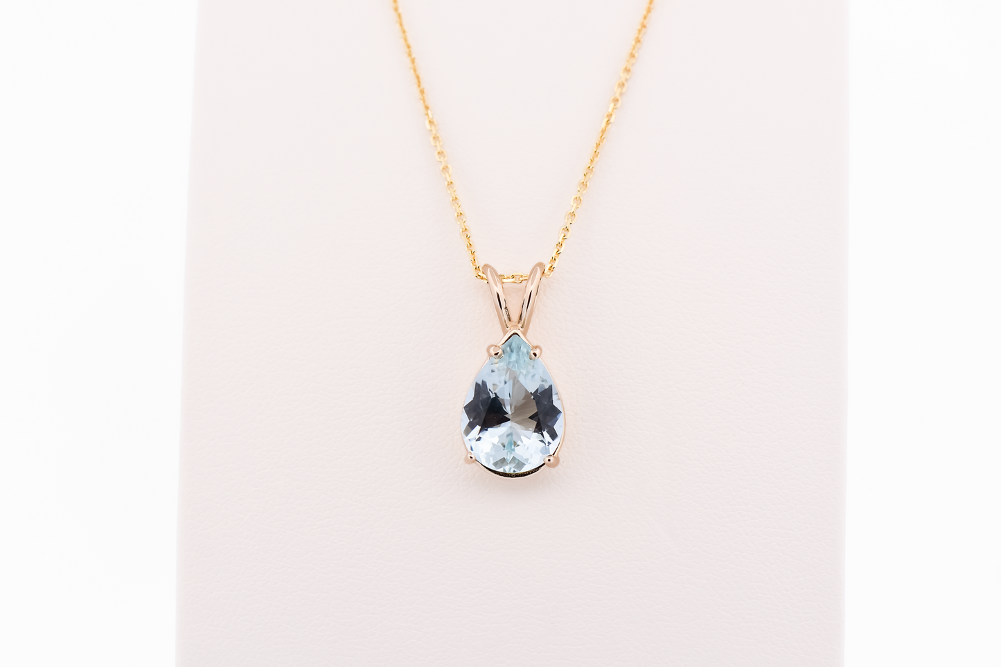 Pear Shape Aquamarine Solitaire Pendant in 14k Yellow Gold