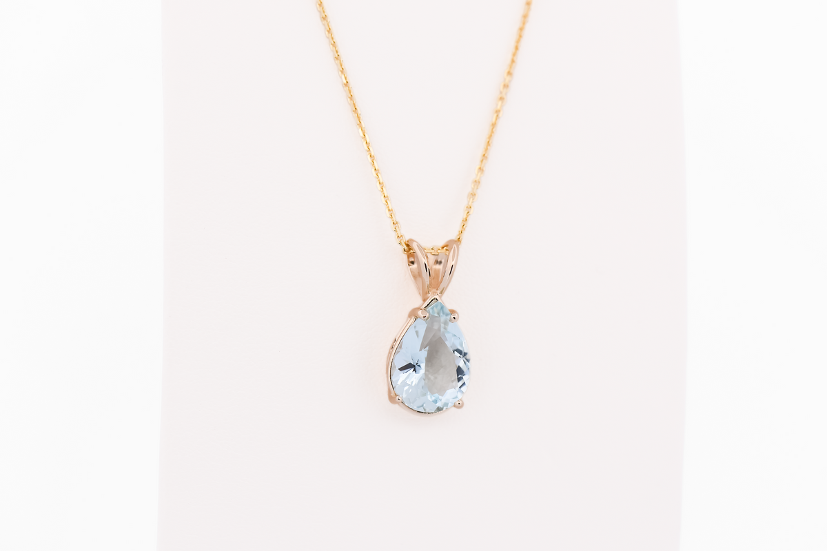 Pear Shape Aquamarine Solitaire Pendant in 14k Yellow Gold
