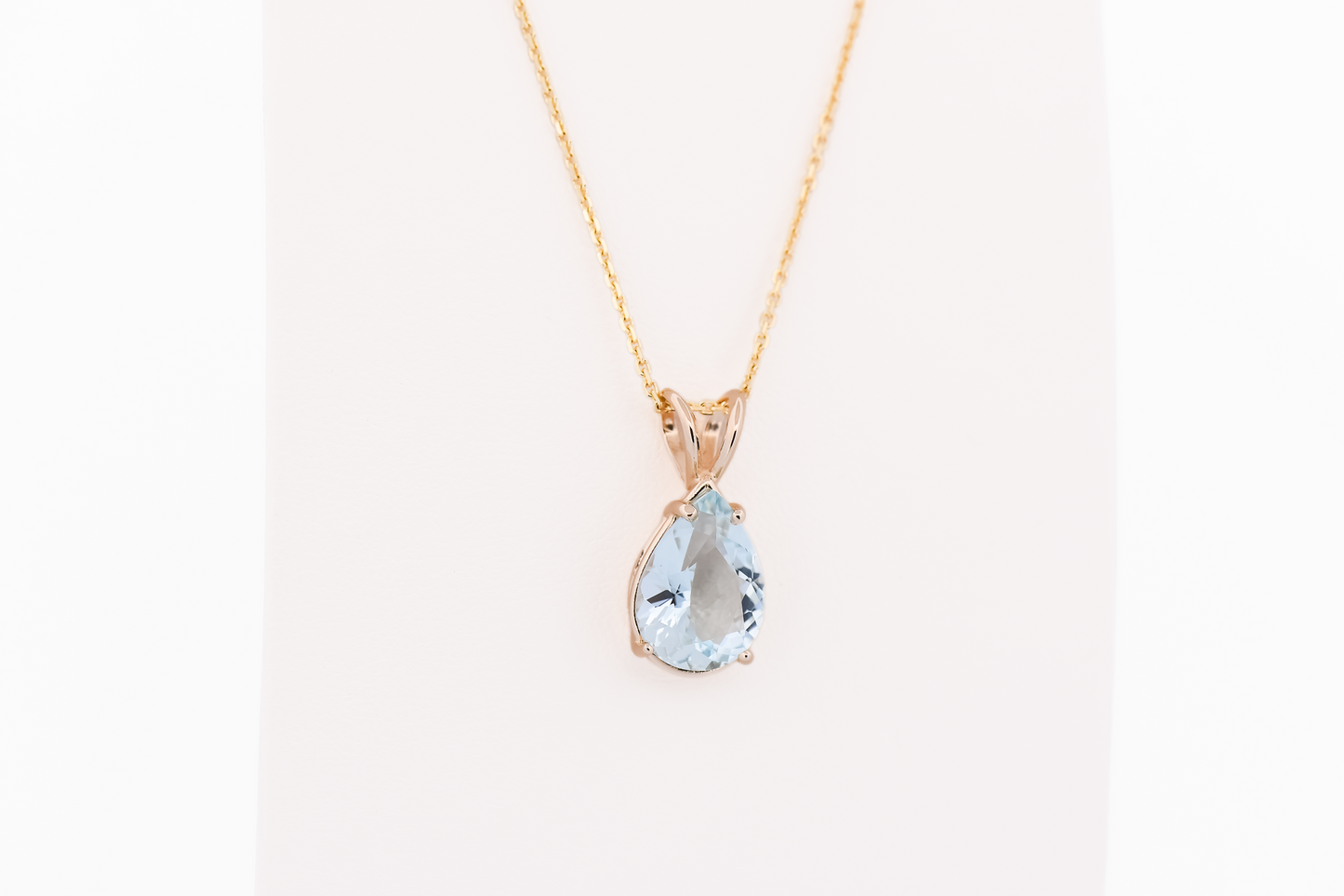 Pear Shape Aquamarine Solitaire Pendant in 14k Yellow Gold