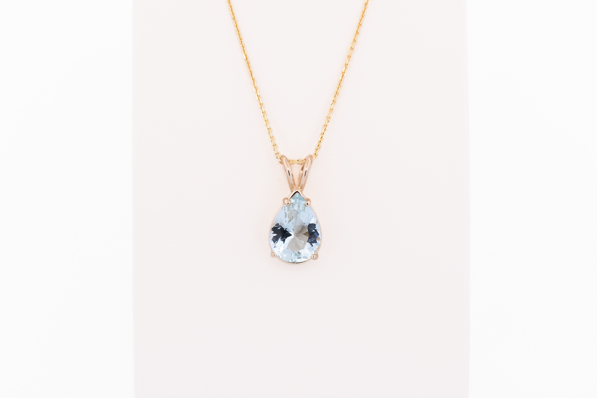Pear Shape Aquamarine Solitaire Pendant in 14k Yellow Gold