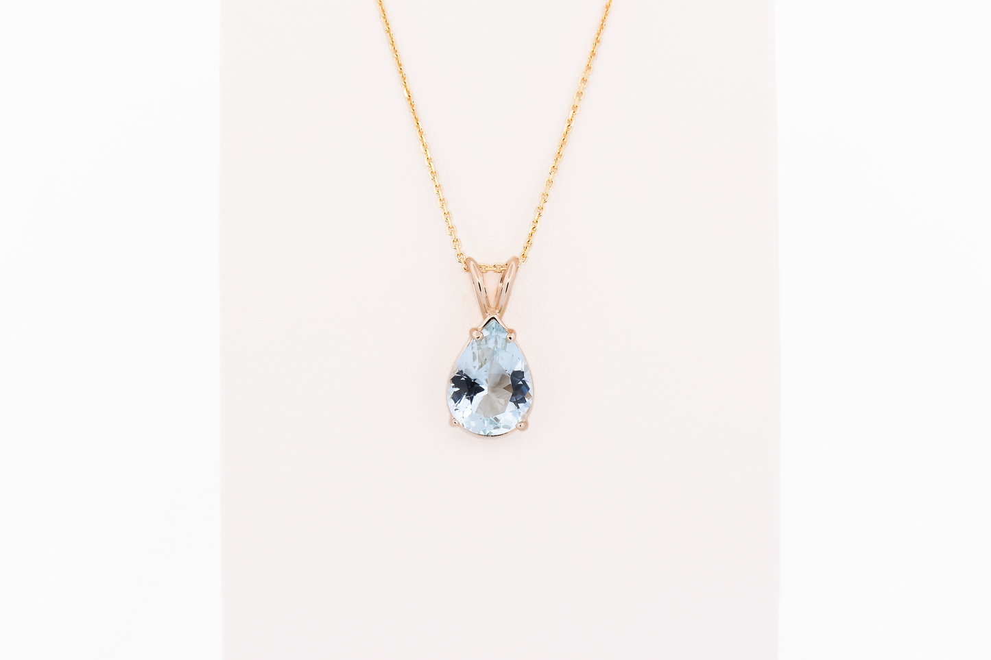 Pear Shape Aquamarine Solitaire Pendant in 14k Yellow Gold