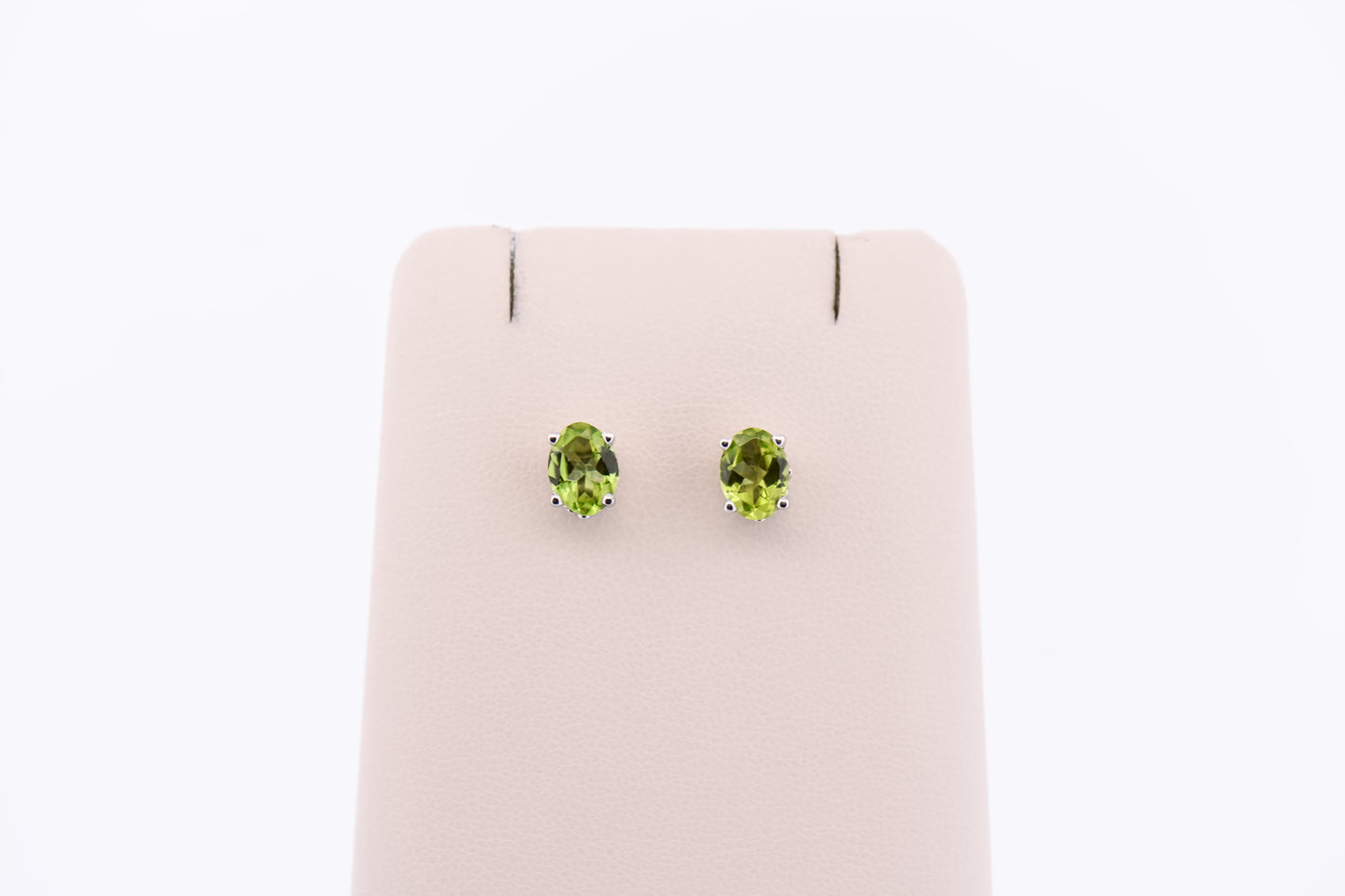 Oval Peridot Stud Earrings in White Gold