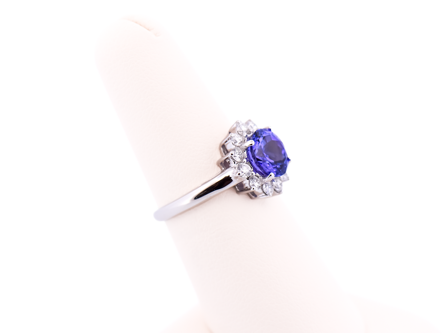 Portuguese Cut Round Tanzanite & Diamond Halo Ring in White Gold