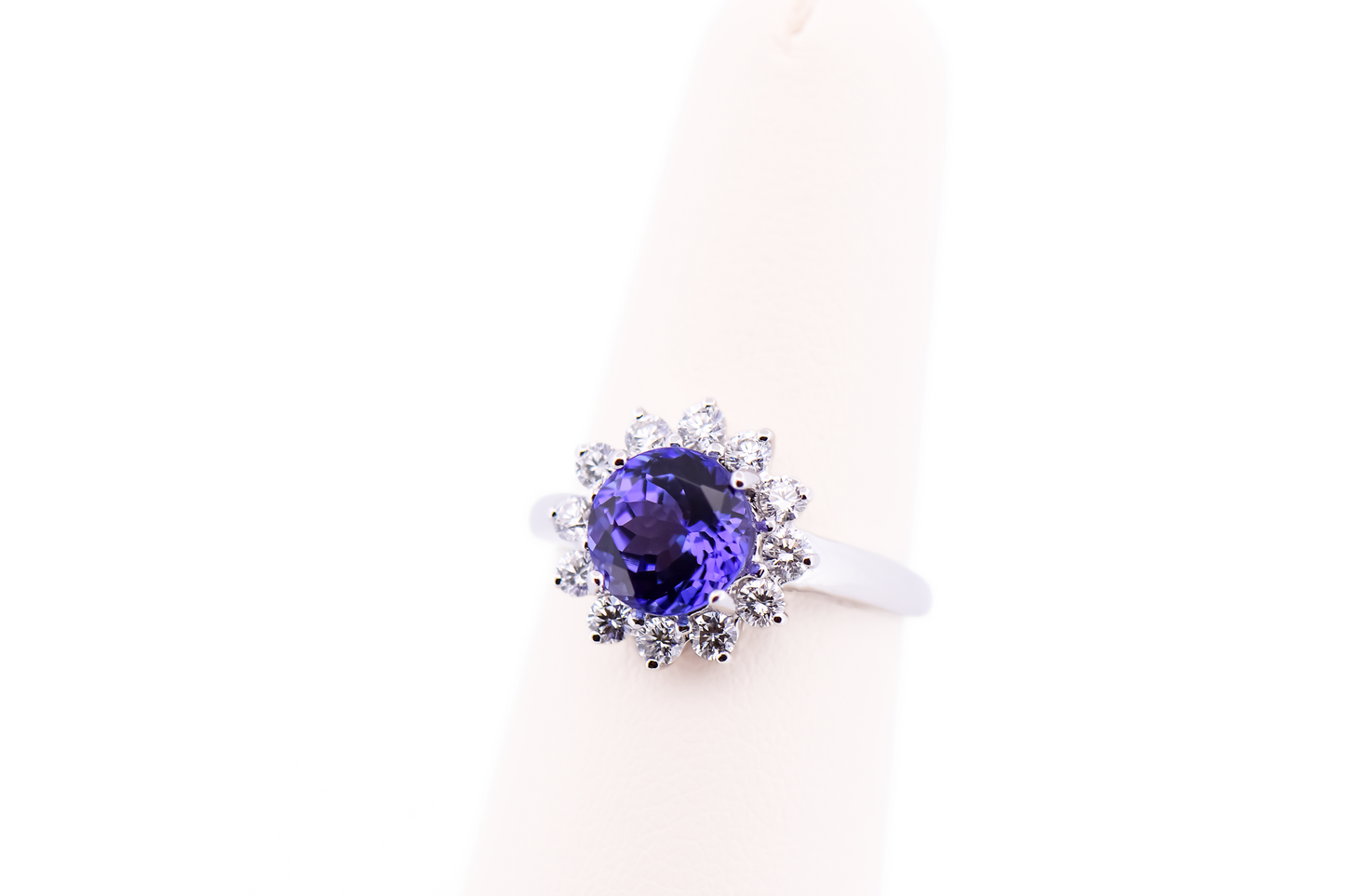 Portuguese Cut Round Tanzanite & Diamond Halo Ring in White Gold