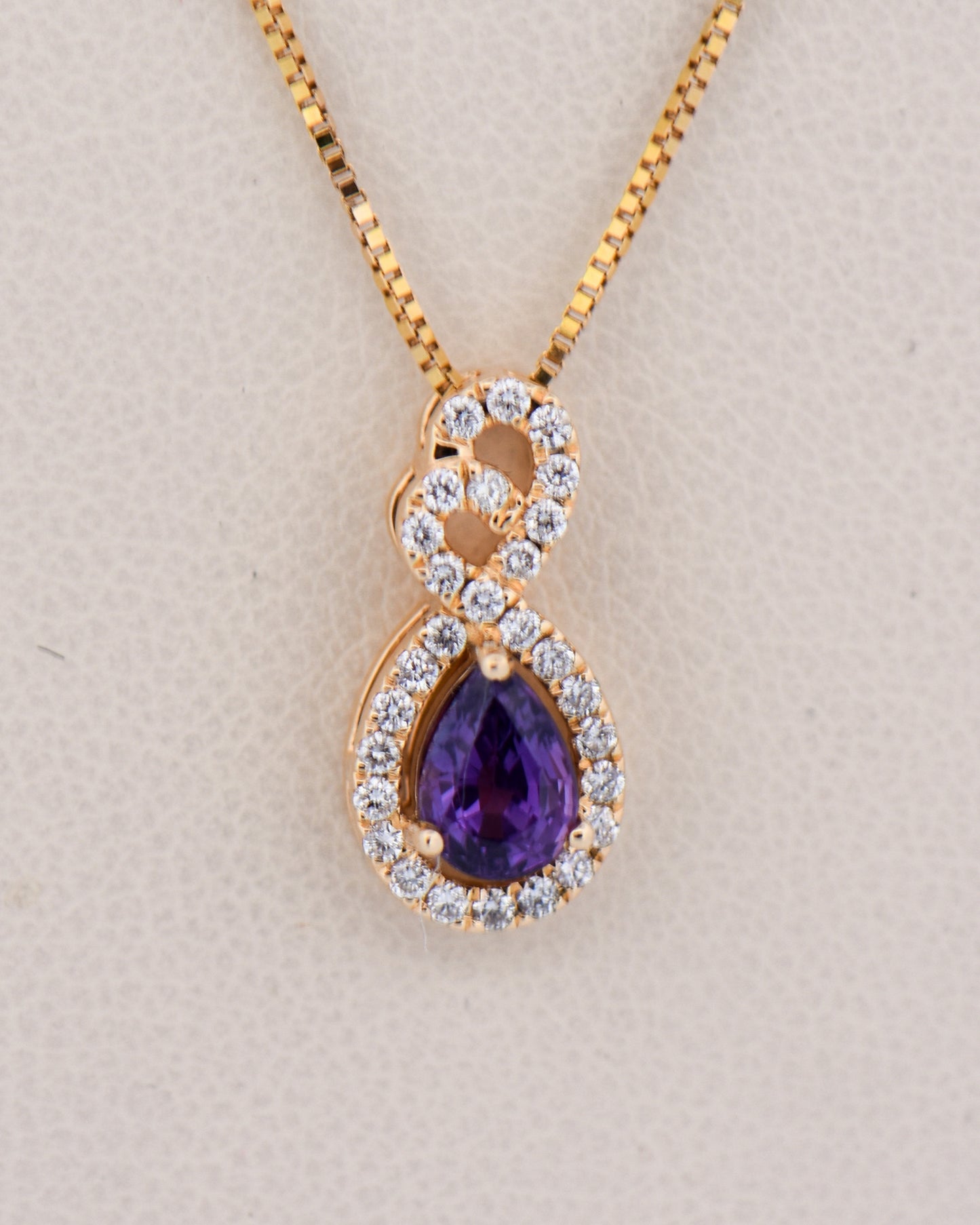 Purple Sapphire & Diamond Pendant in Yellow Gold