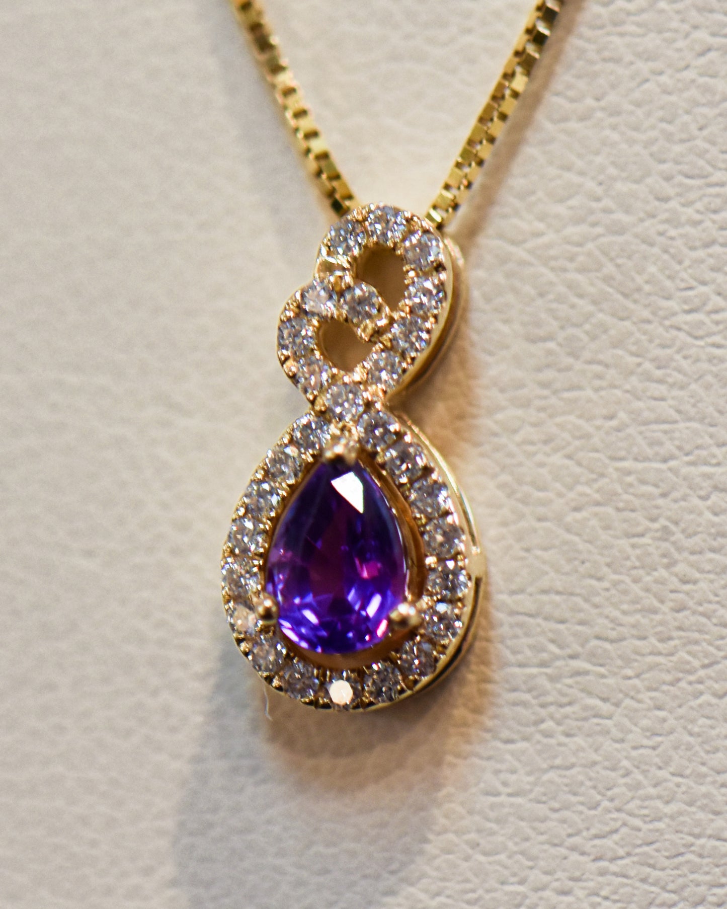 Purple Sapphire & Diamond Pendant in Yellow Gold