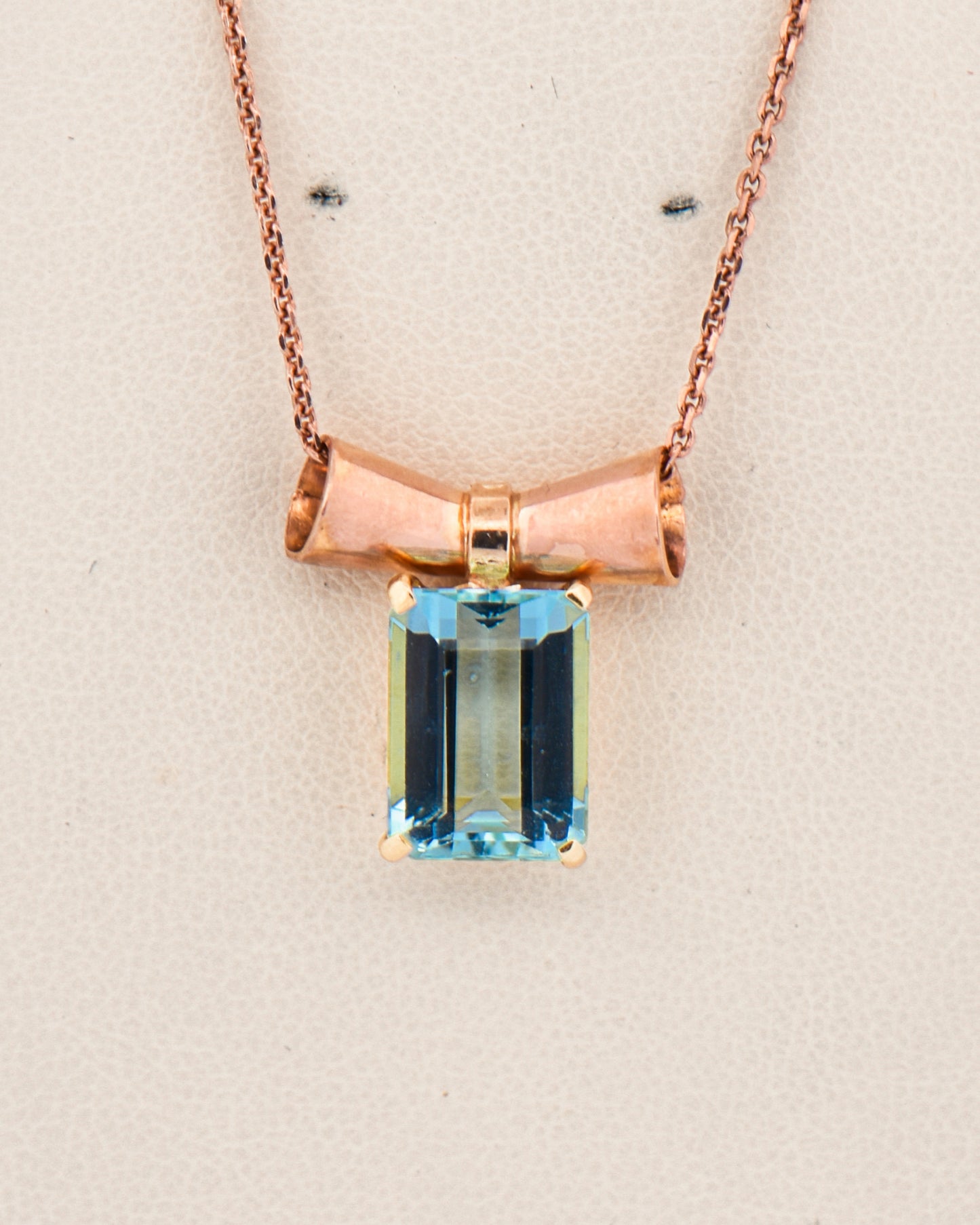 Retro Aquamarine Pendant with Rose Gold Bow Motif