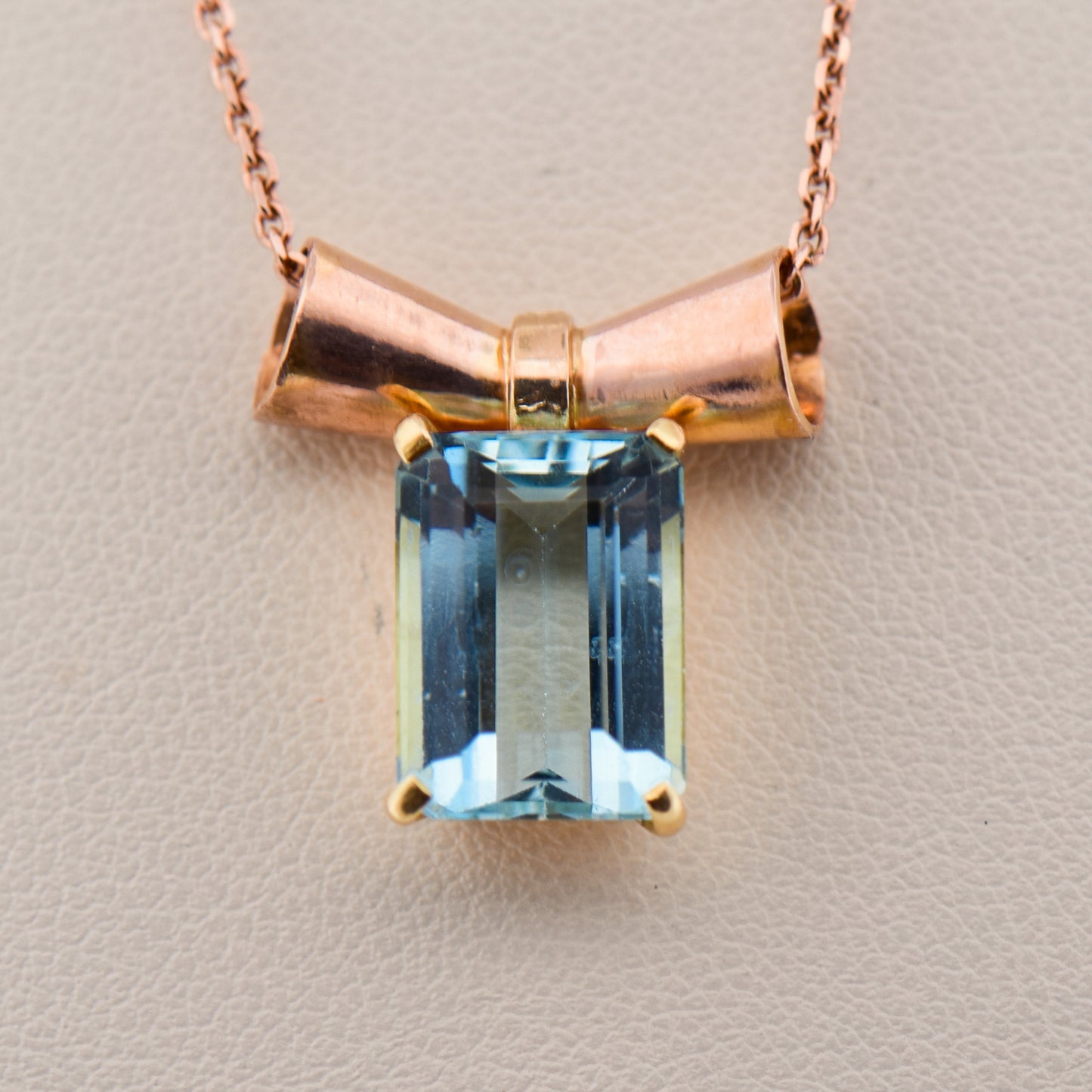 Retro Aquamarine Pendant with Rose Gold Bow Motif
