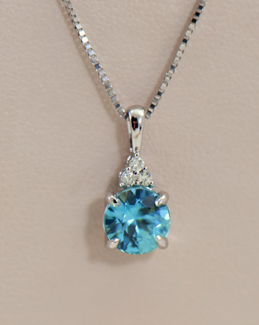 Round Blue Zircon and Diamond Pendant in White Gold