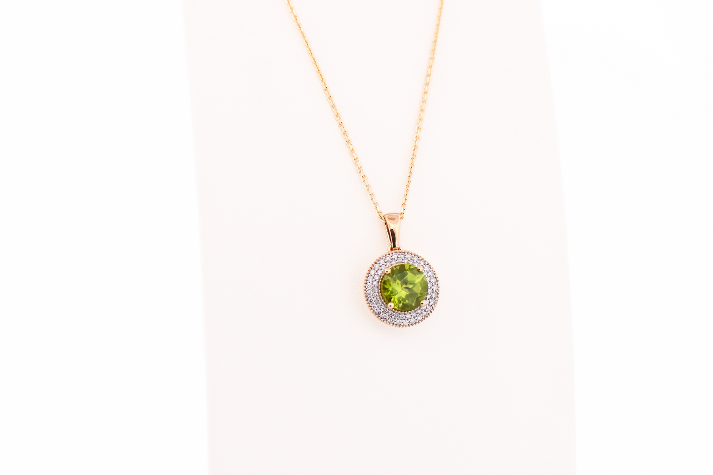 Round Peridot Pendant With Diamond Pave Halo in Yellow Gold