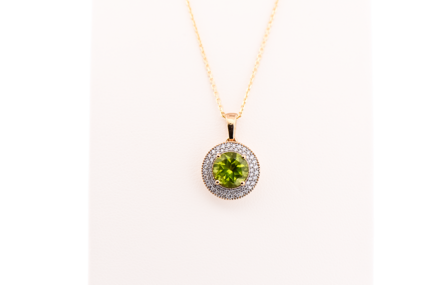 Round Peridot Pendant With Diamond Pave Halo in Yellow Gold
