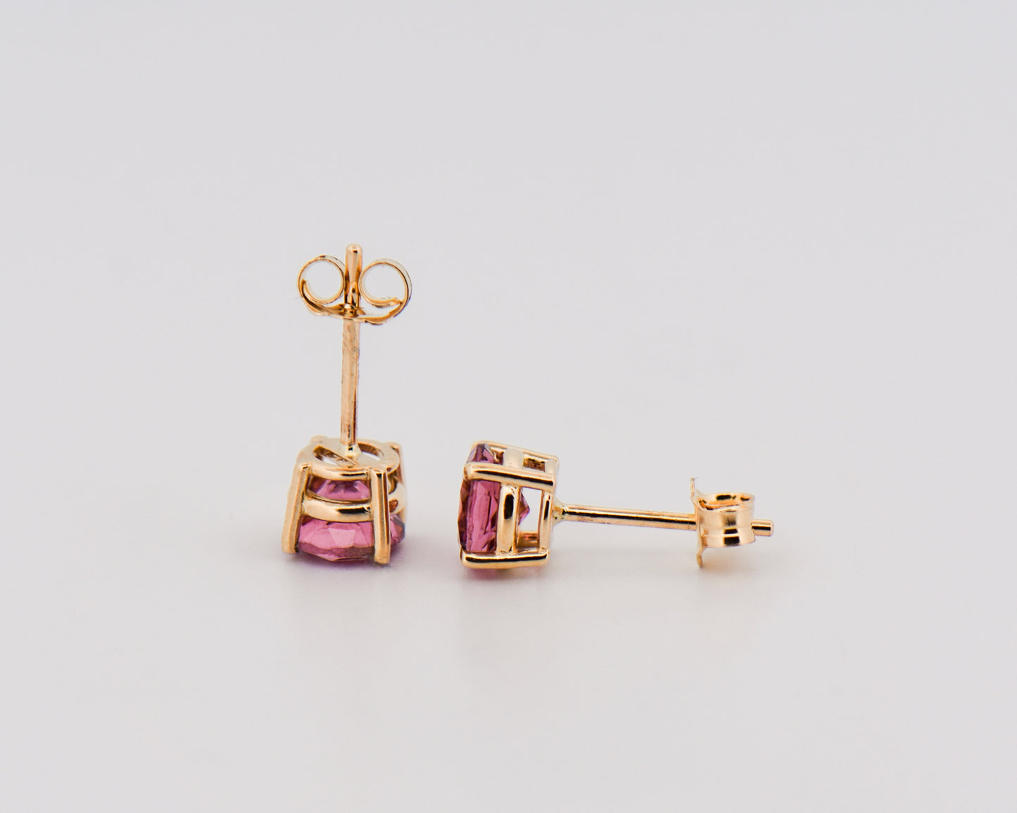 Round Pink Tourmaline Studs in Yellow Gold