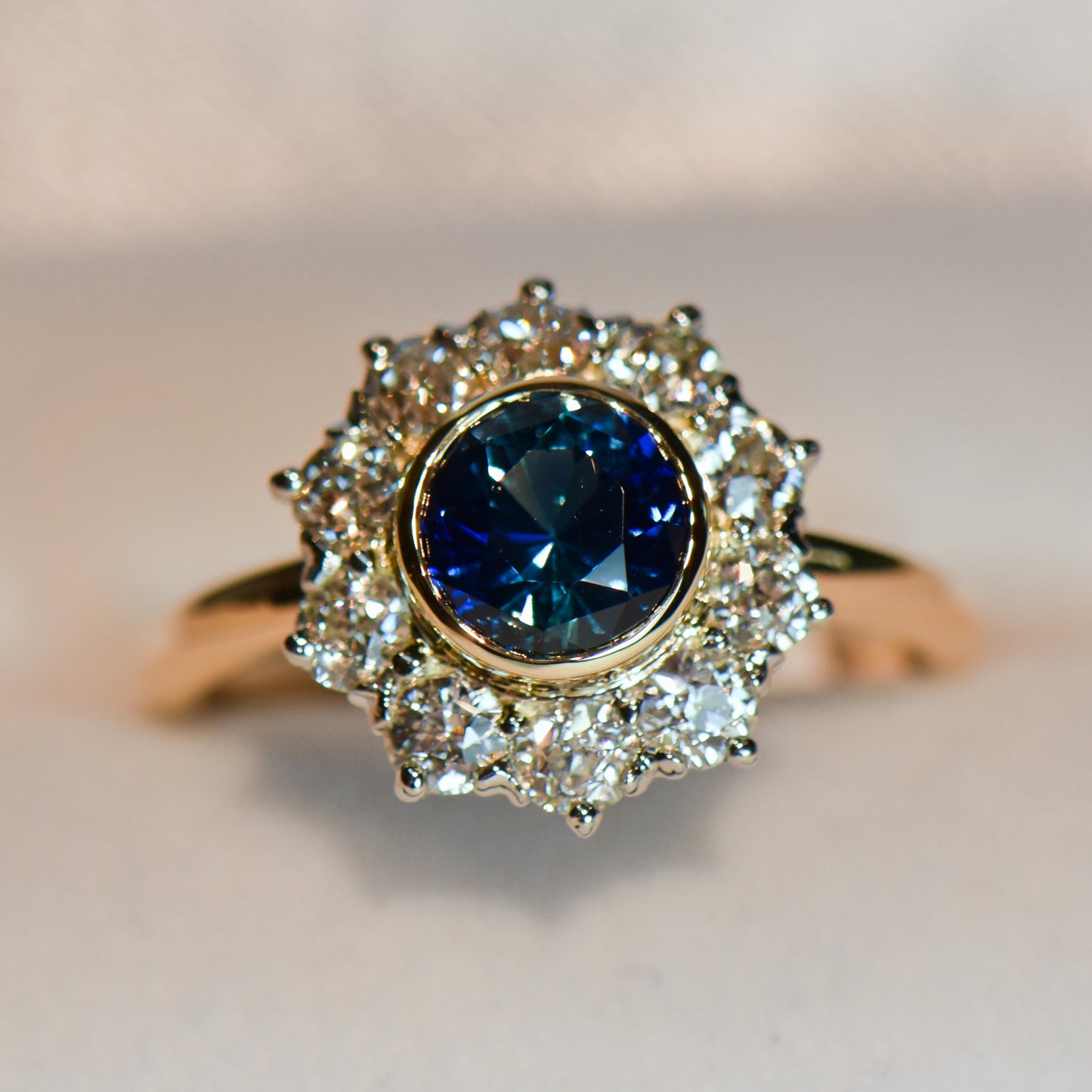 Antique Bezel Set Teal-Blue Sapphire & Old Euro Diamond Halo Ring