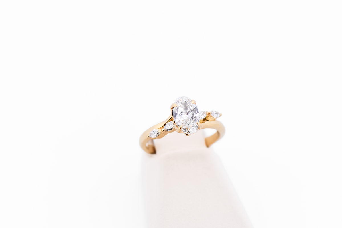 Skinny Oval Diamond Engagement Ring with Marquise Accents in Yellow Gold