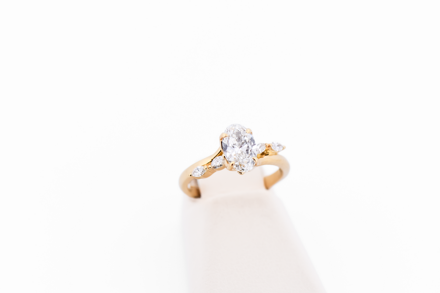 Skinny Oval Diamond Engagement Ring with Marquise Accents in Yellow Gold