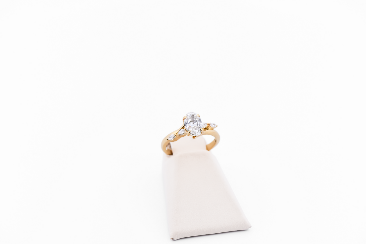 Skinny Oval Diamond Engagement Ring with Marquise Accents in Yellow Gold
