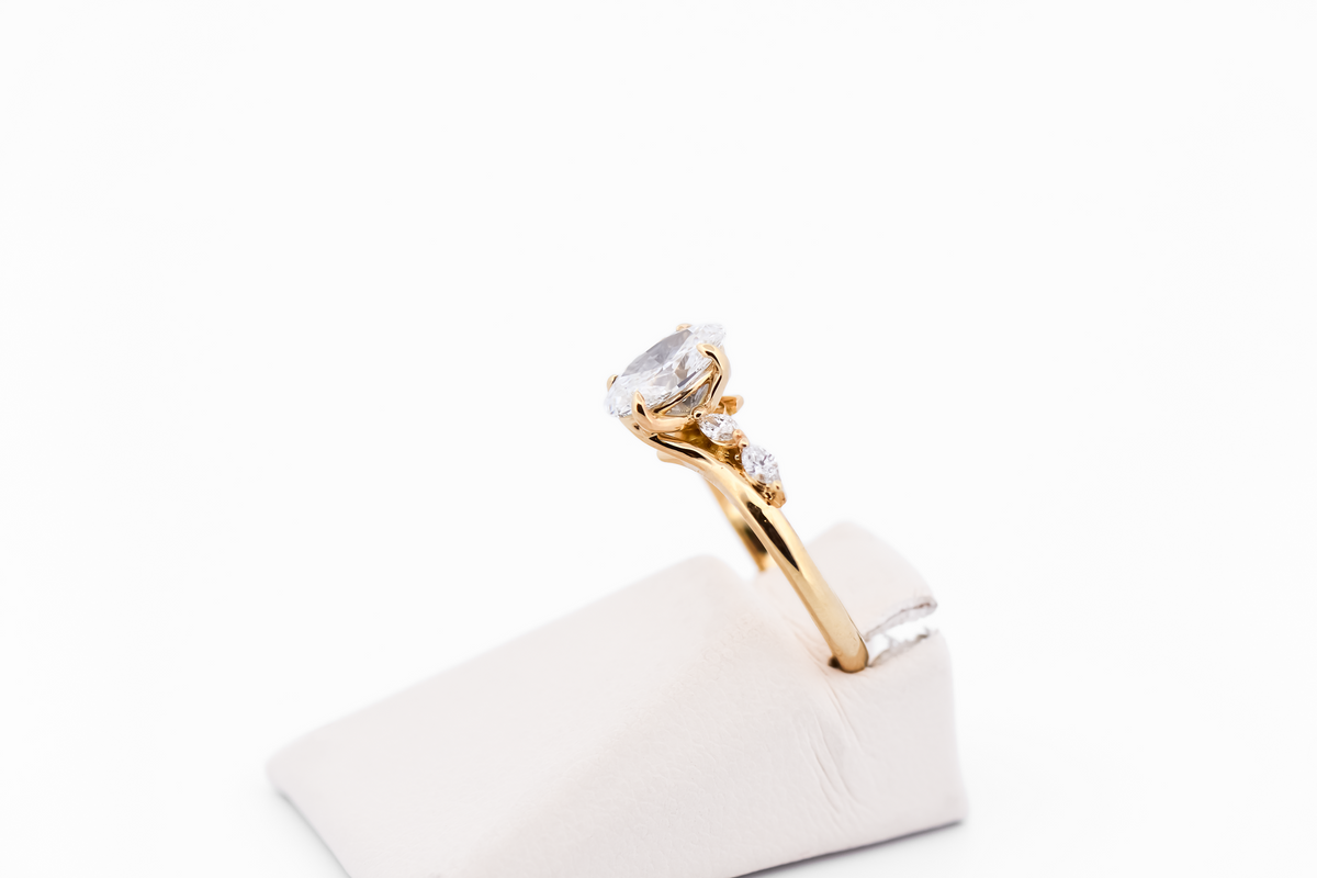 Skinny Oval Diamond Engagement Ring with Marquise Accents in Yellow Gold