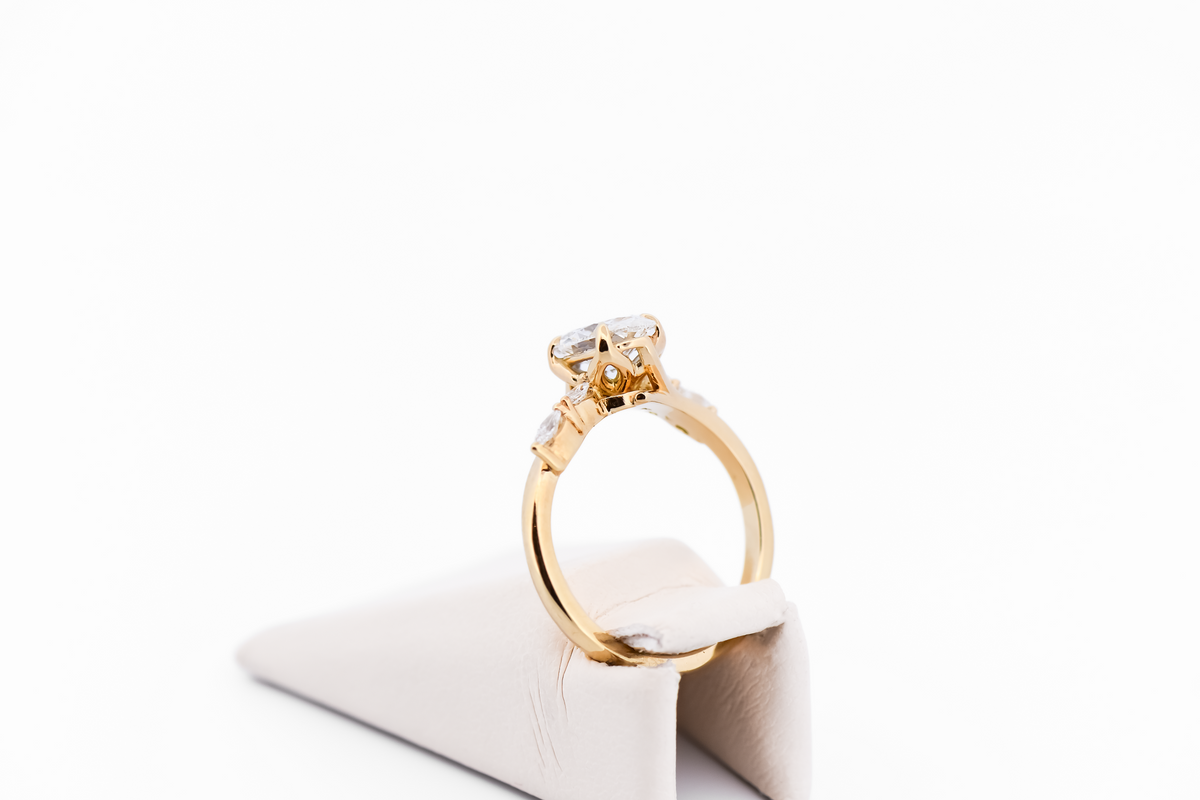Skinny Oval Diamond Engagement Ring with Marquise Accents in Yellow Gold