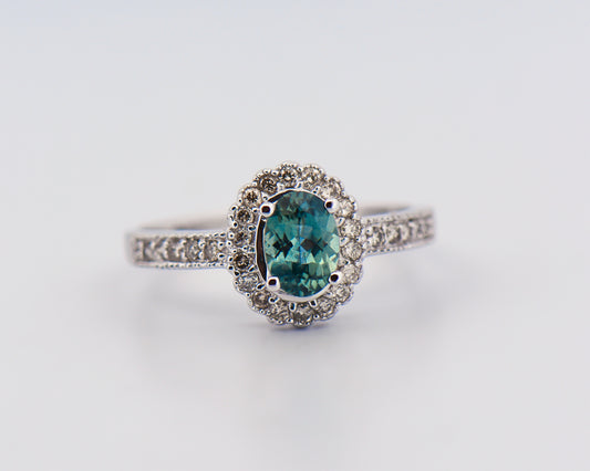 Teal Sapphire Halo Engagment Ring in White Gold