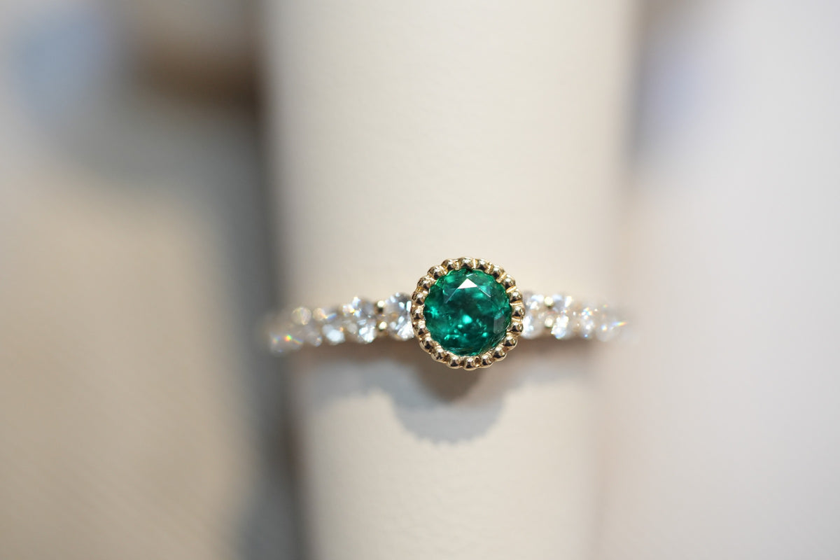 Top Gem Quality Round Emerald Engagement Ring in Yellow Gold Milgrain Bezel