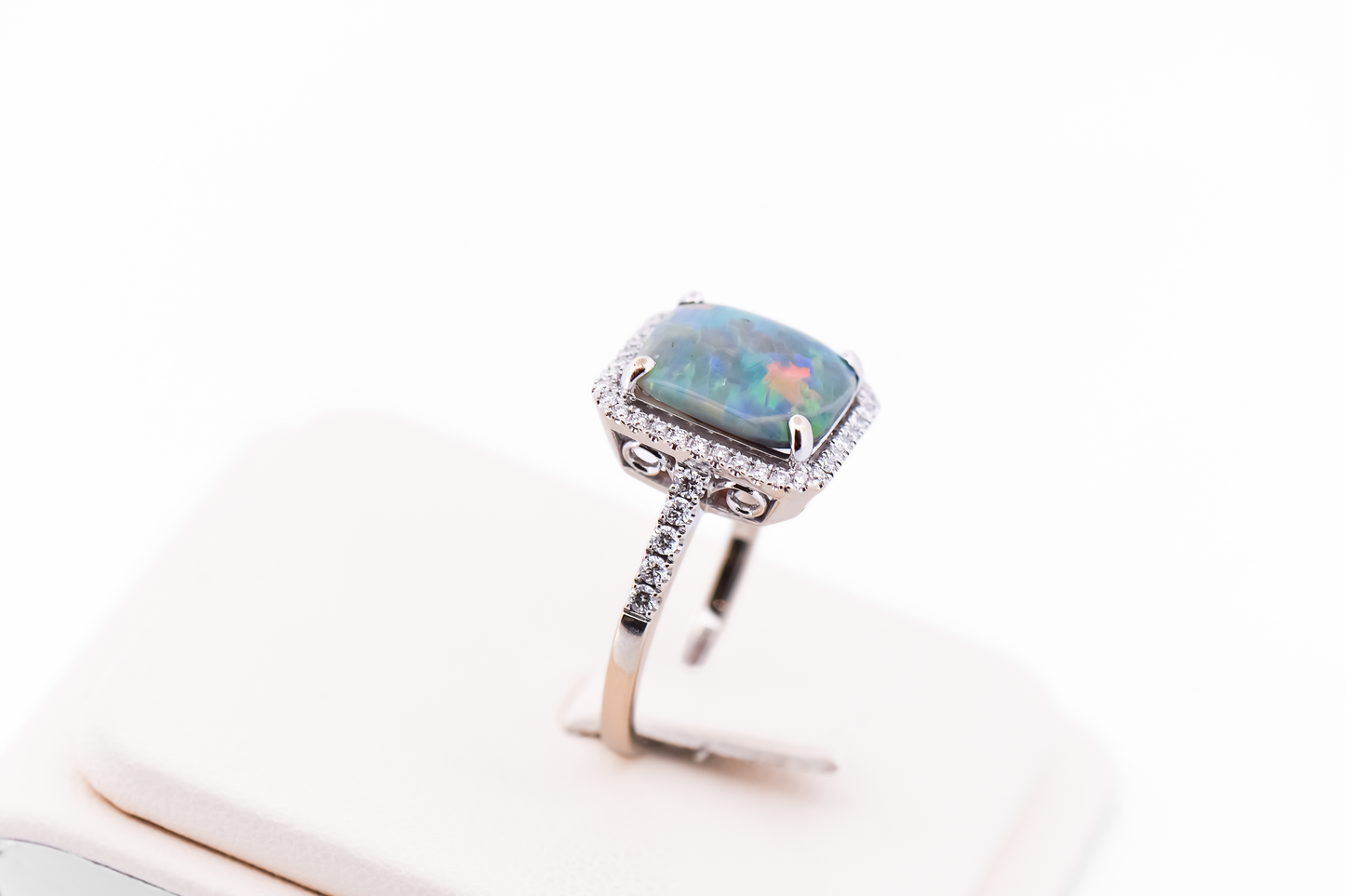 Top Quality Rectangular Australian Black Opal Engagement Ring with Diamond Halo