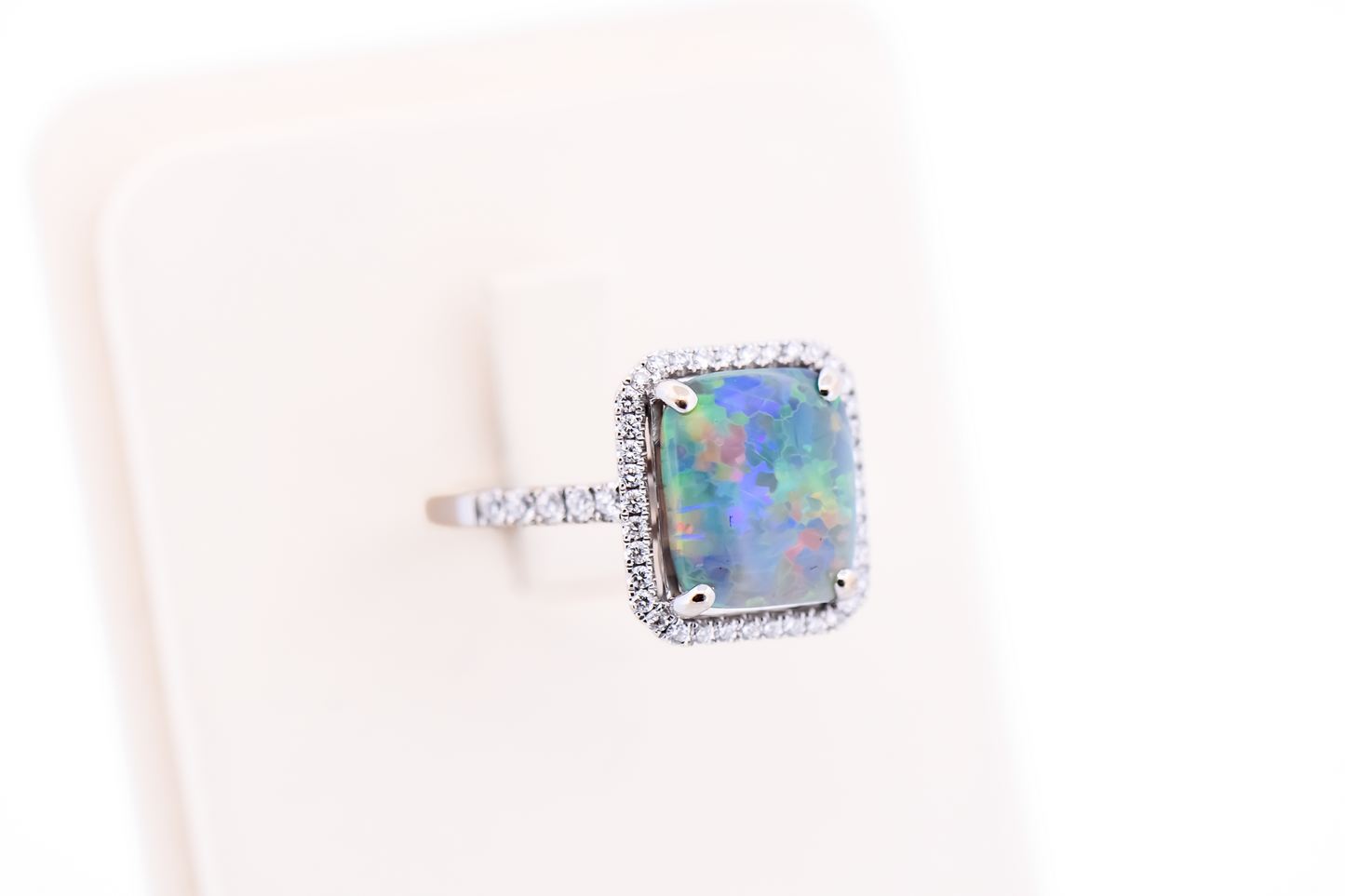 Top Quality Rectangular Australian Black Opal Engagement Ring with Diamond Halo