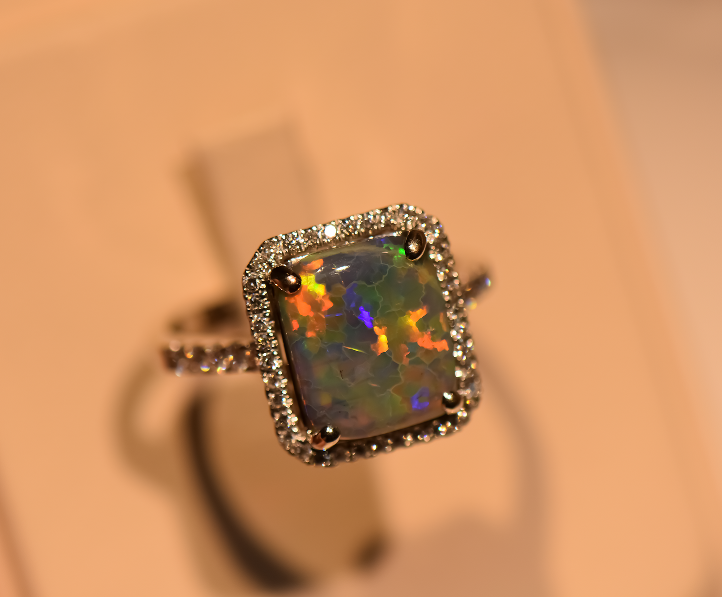 Top Quality Rectangular Australian Black Opal Engagement Ring with Diamond Halo