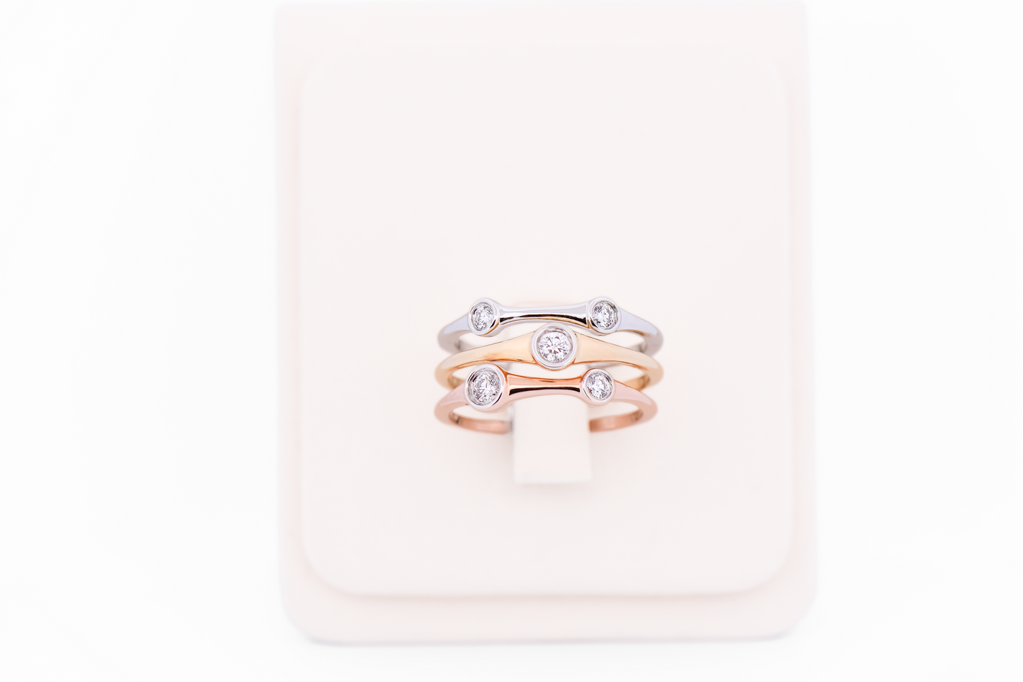 Tricolor Gold Ring with Bezel-Set Diamonds