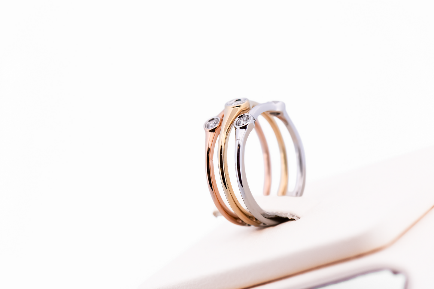 Tricolor Gold Ring with Bezel-Set Diamonds