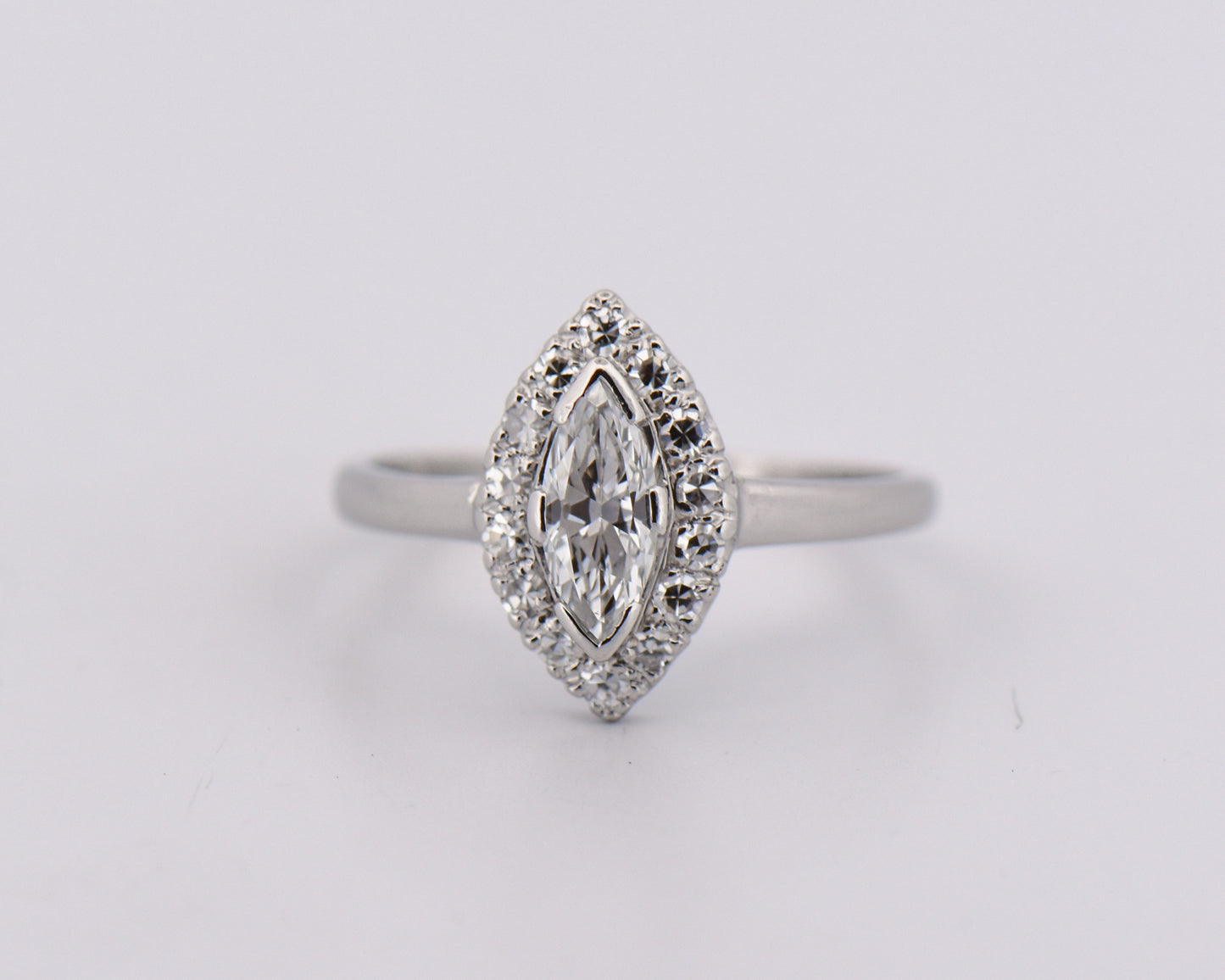 Vintage Marquise Diamond Halo Engagement Ring in Platinum