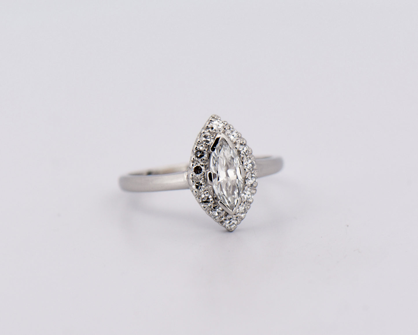 Vintage Marquise Diamond Halo Engagement Ring in Platinum
