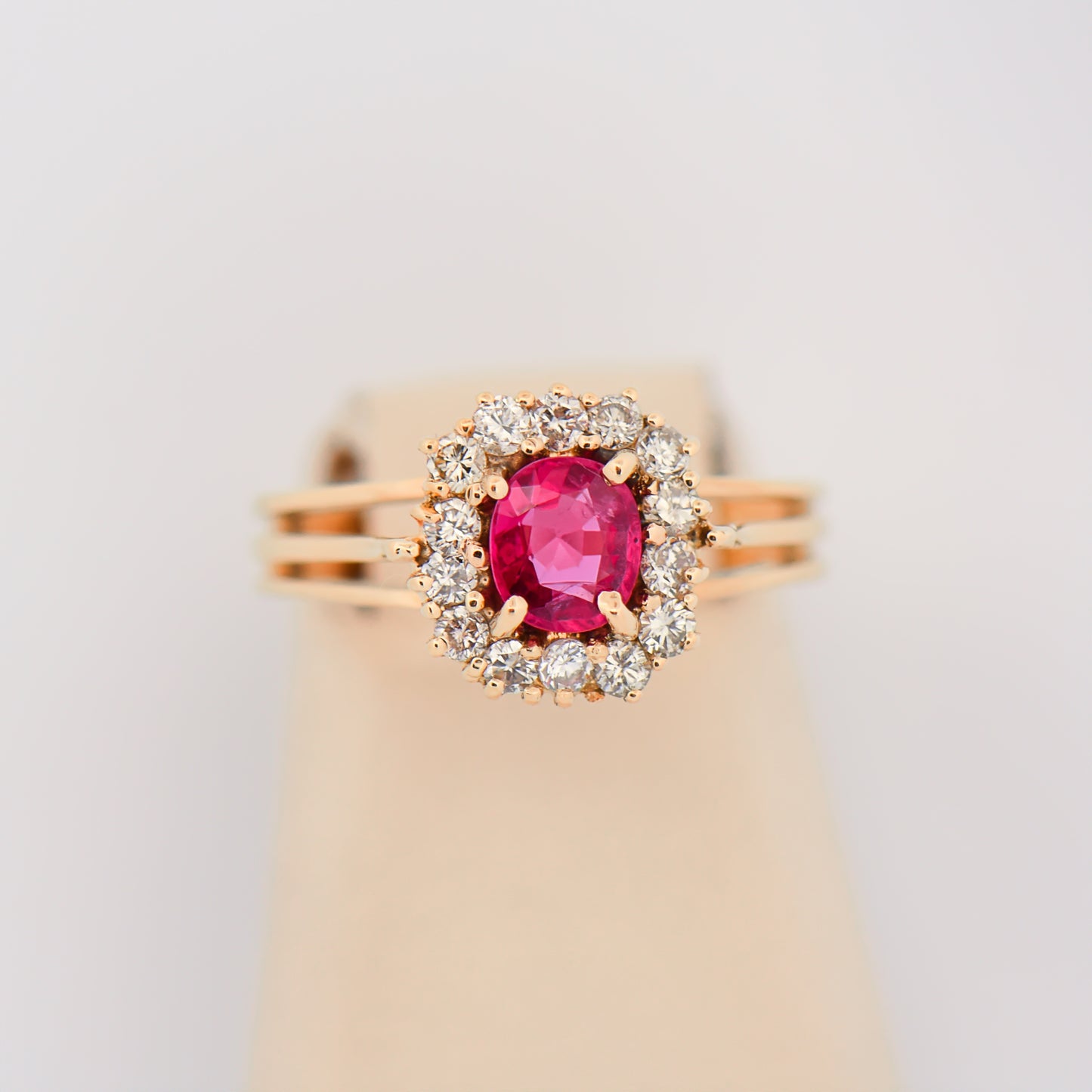 Vintage Pink Sapphire Halo Ring in Yellow Gold