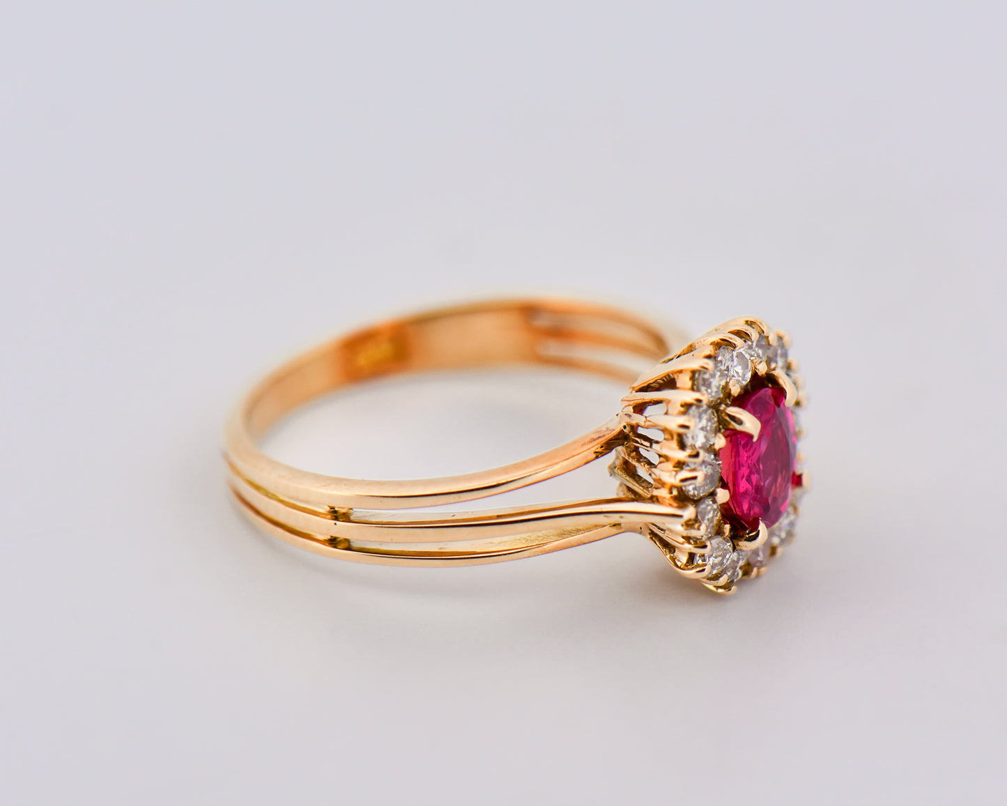 Vintage Pink Sapphire Halo Ring in Yellow Gold