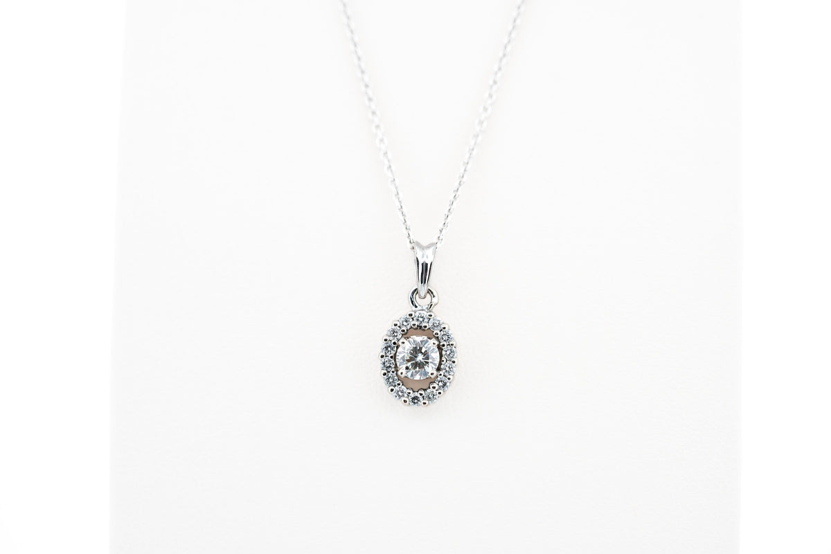 White Gold & Diamond Pendant - Round Diamond with Oval Halo Frame