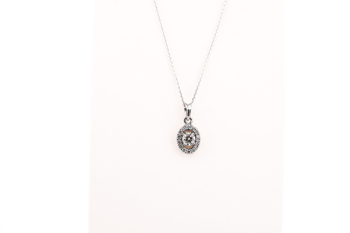 White Gold & Diamond Pendant - Round Diamond with Oval Halo Frame