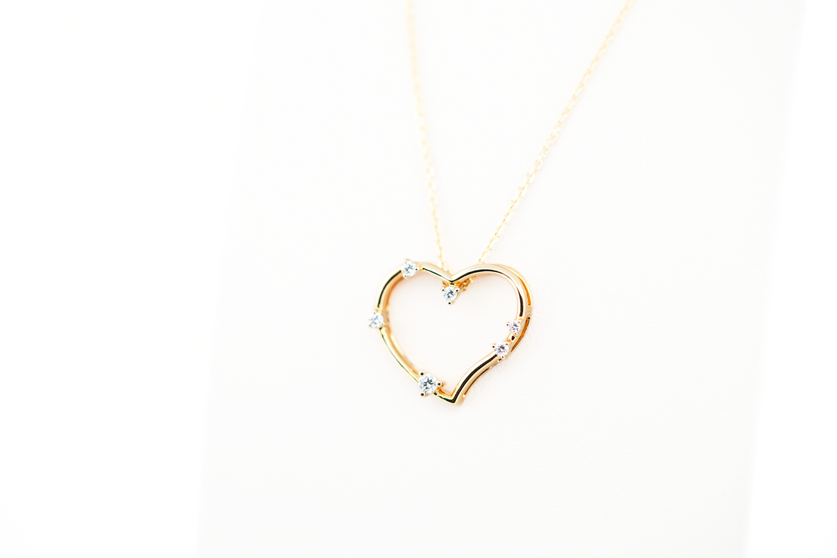 Yellow Gold & Diamond Heart Pendant - Twisted "Witch's Heart" Shape