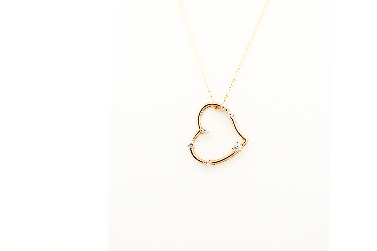 Yellow Gold & Diamond Heart Pendant - Twisted "Witch's Heart" Shape
